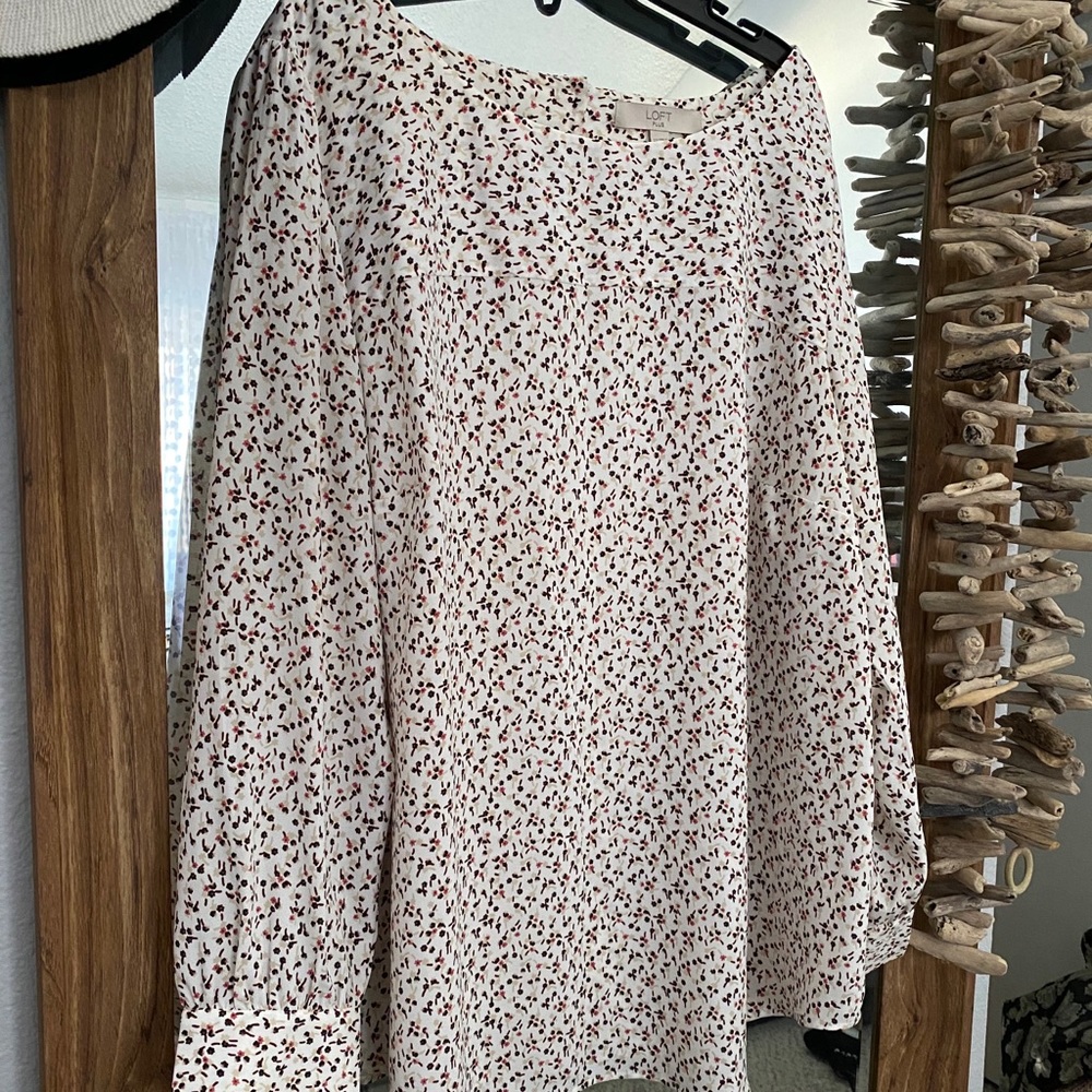 Woman’s subtle floral print blouse from Loft